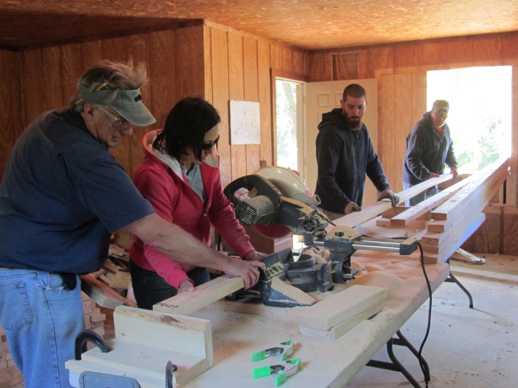 Sherwood Forest Camp Trades Weekend - cutting wood