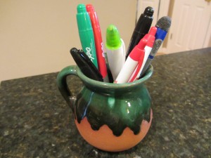 Coffee mug used as pencil holder