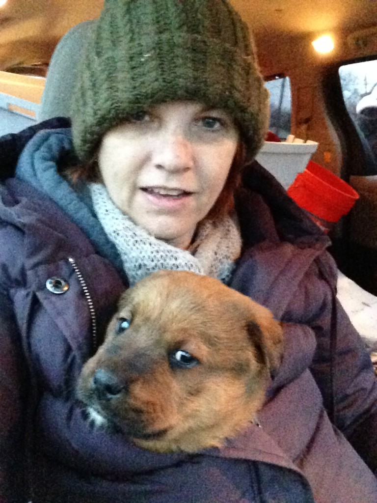 Karen Goodman holding rescued puppy