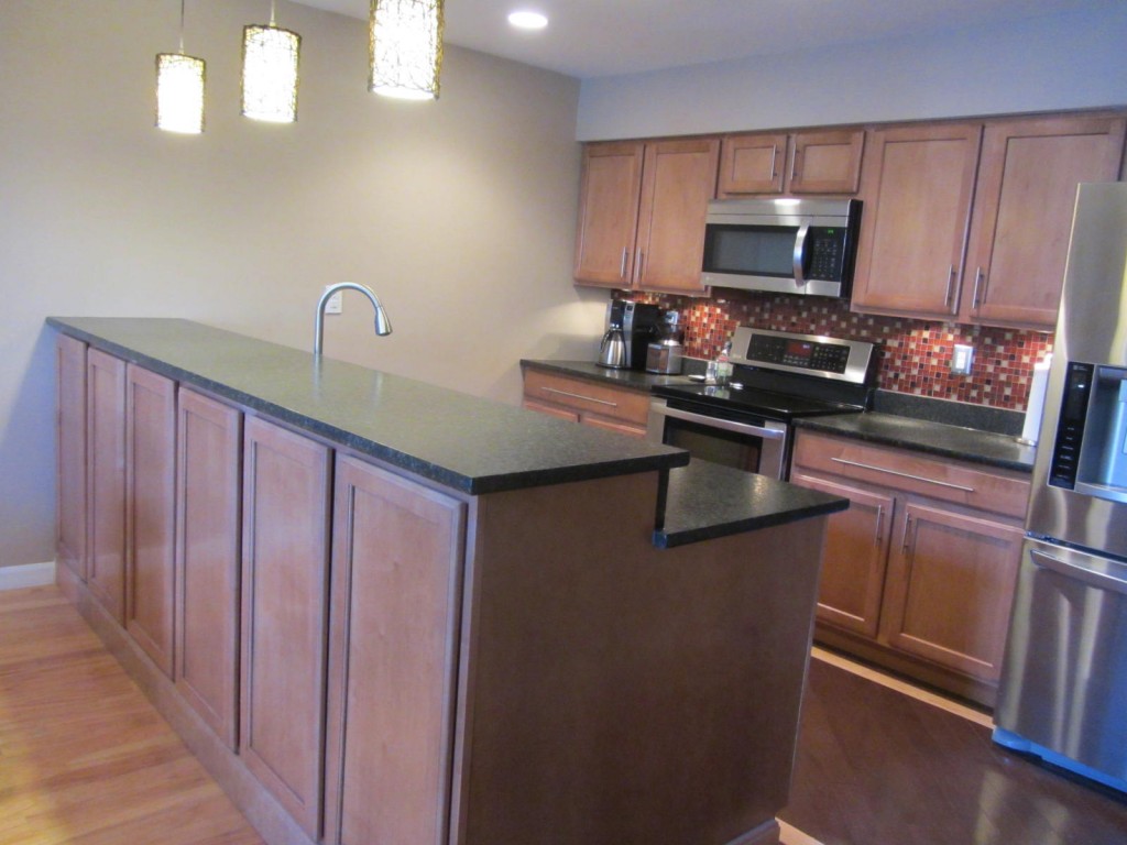 Kitchen remodel with upper cabinets for extra storage