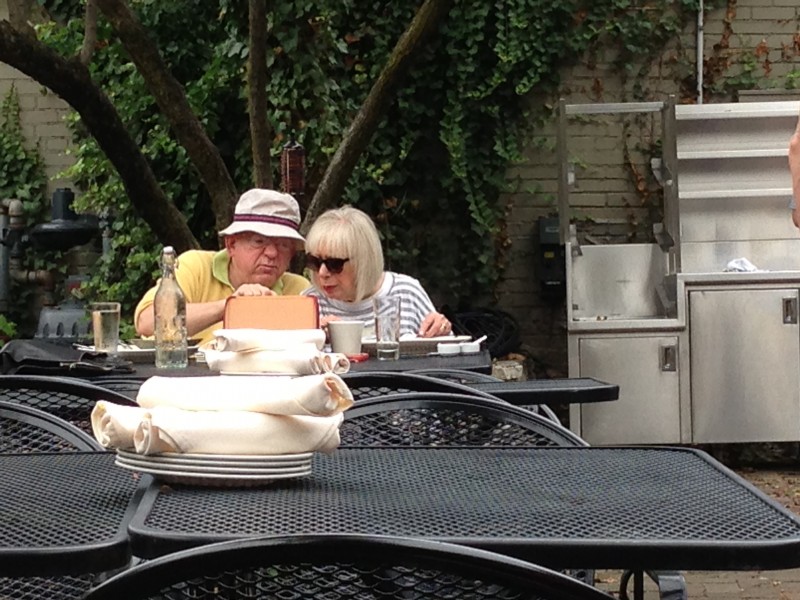 Couple watching move at dinner - Future Expat